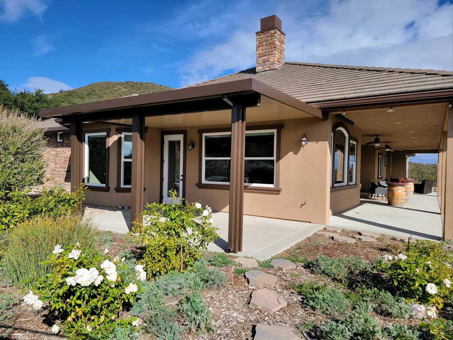 Non-insulated flat pan aluminum patio cover in Spanish brown