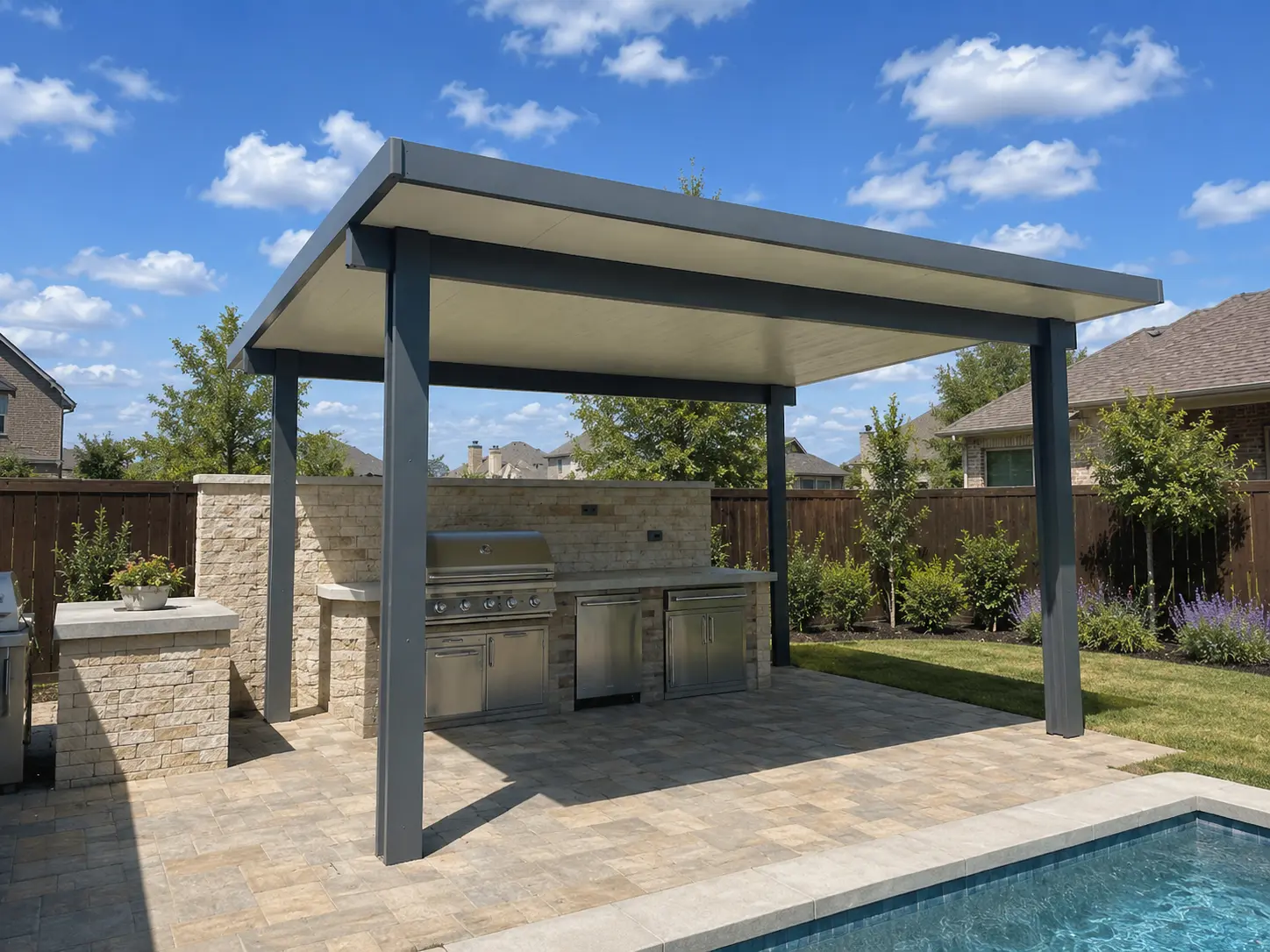 Insulated aluminum patio cover over outdoor kitchen