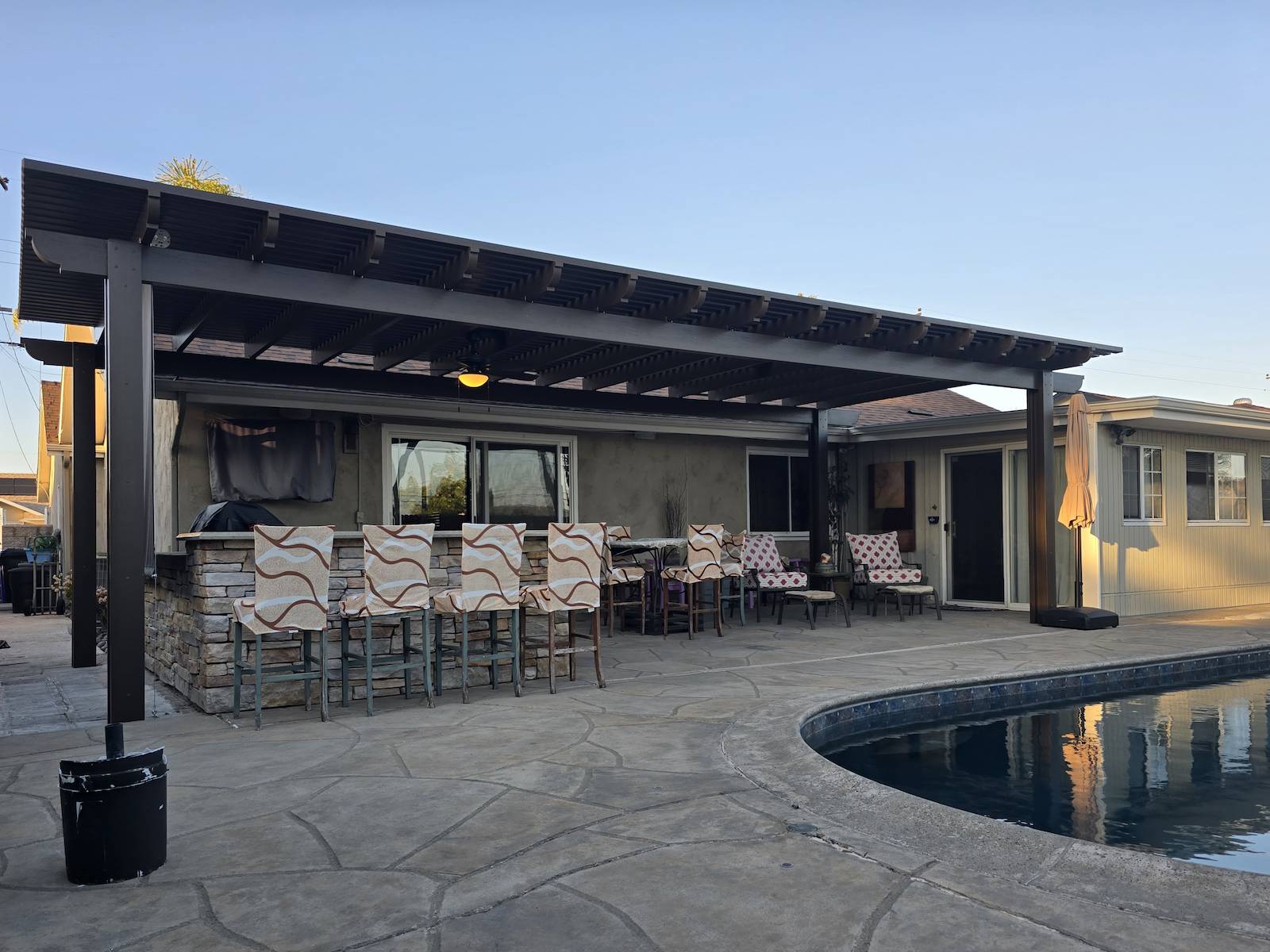 Freestanding aluminum lattice pergola in a Texas backyard